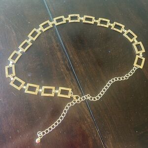 Elegant Gold Chain Link belt
Measures 38 1/2 inches